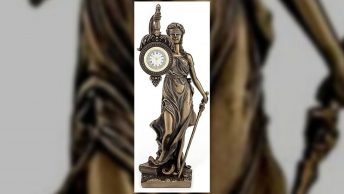 A picture depicting Lady Justice with a clock