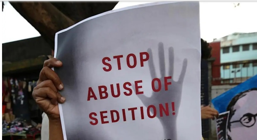 Placard holding "Stop Sedition Abuse"