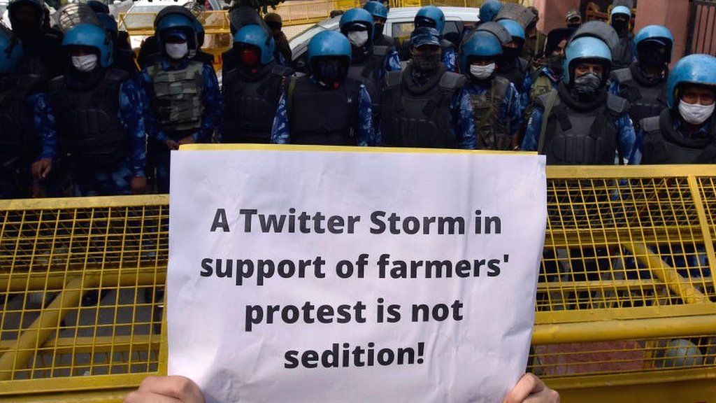 Placard reading, 'A twitter storm in support of farmers protest is not sedition'